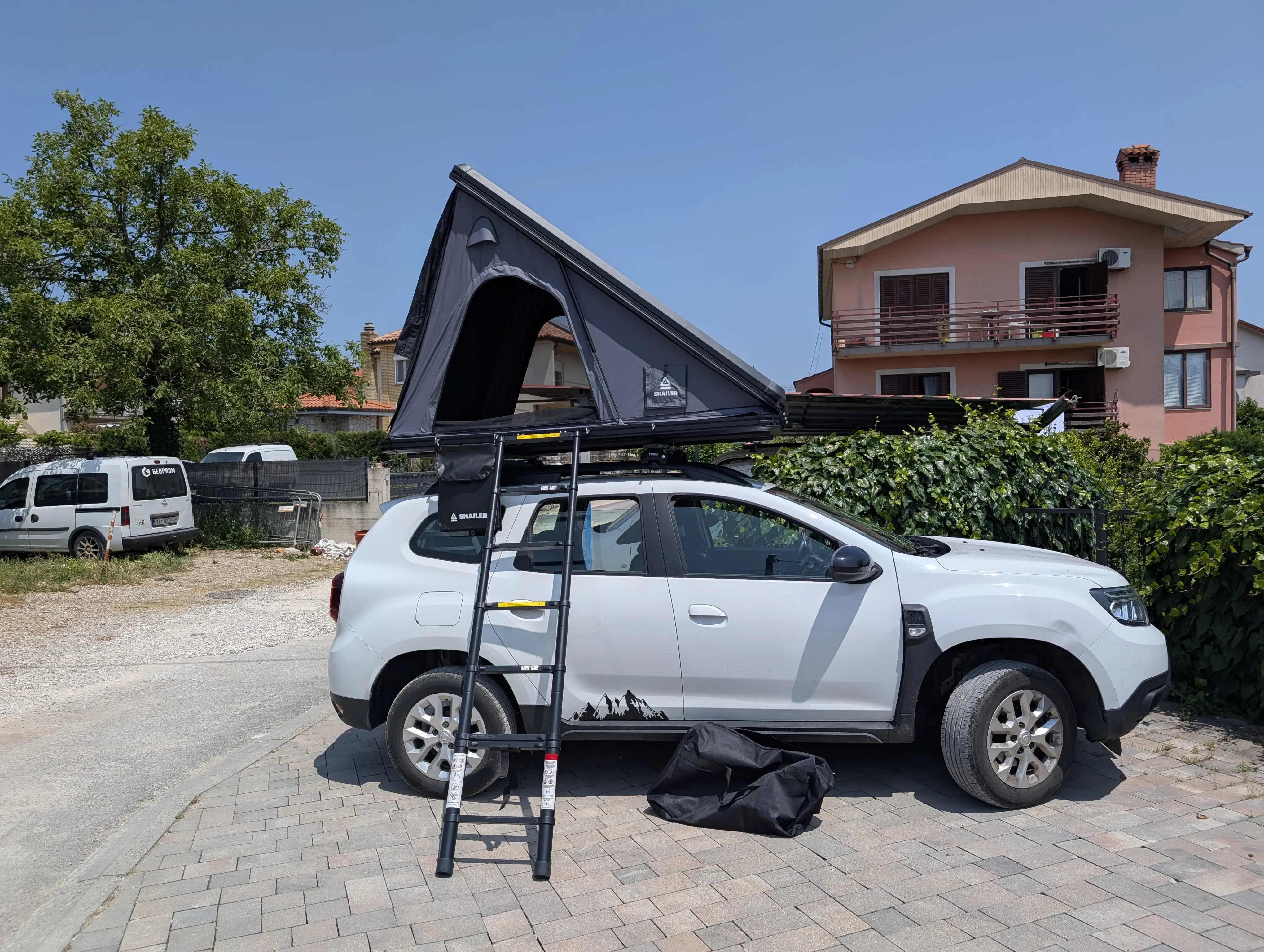 Snailer Alduo stresny stan na aute Dacia Duster - fotografia z galerie zakaznikov z krajiny Taliansko